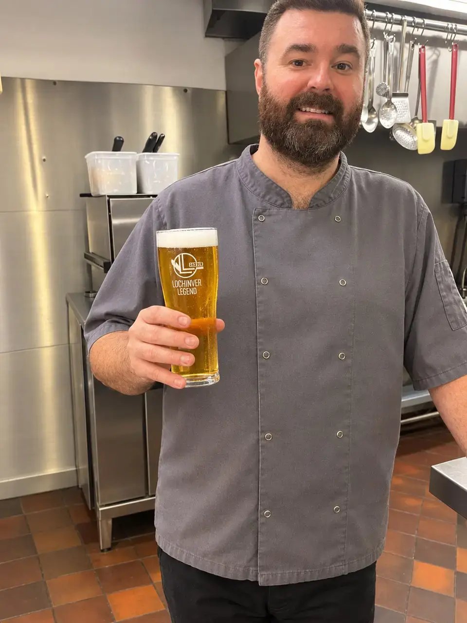 Lewis holding Beer Glass